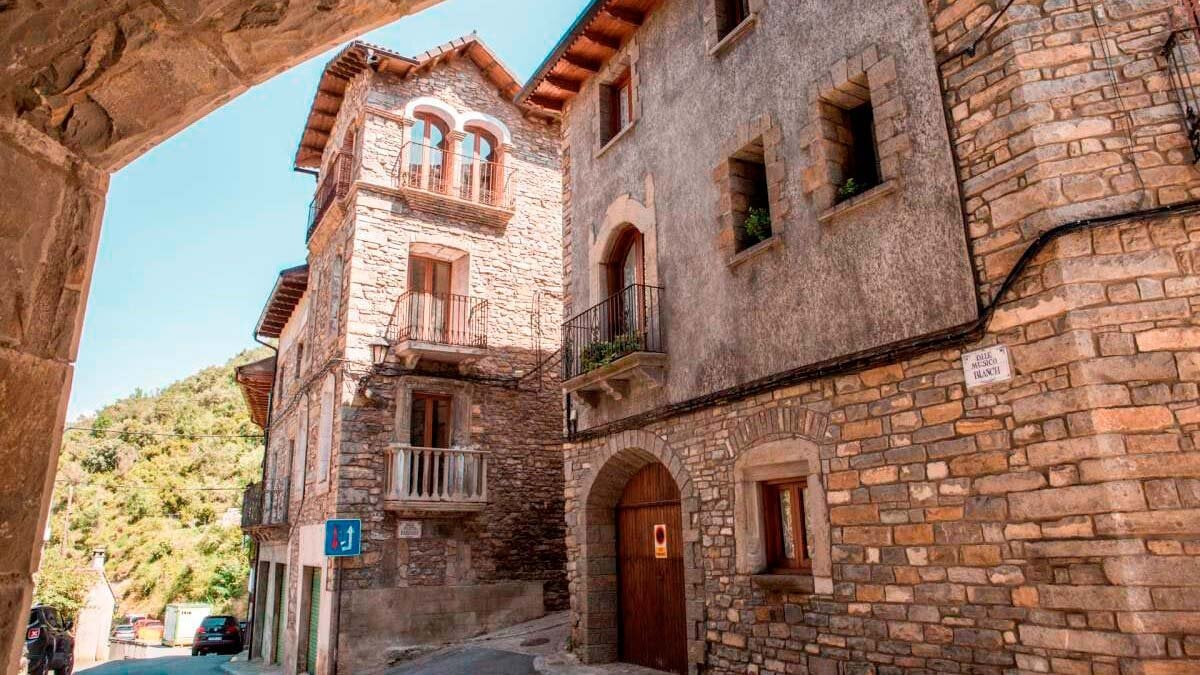 The Huesca Village Crowned by a Medieval Castle and Surrounded by the Pyrenees