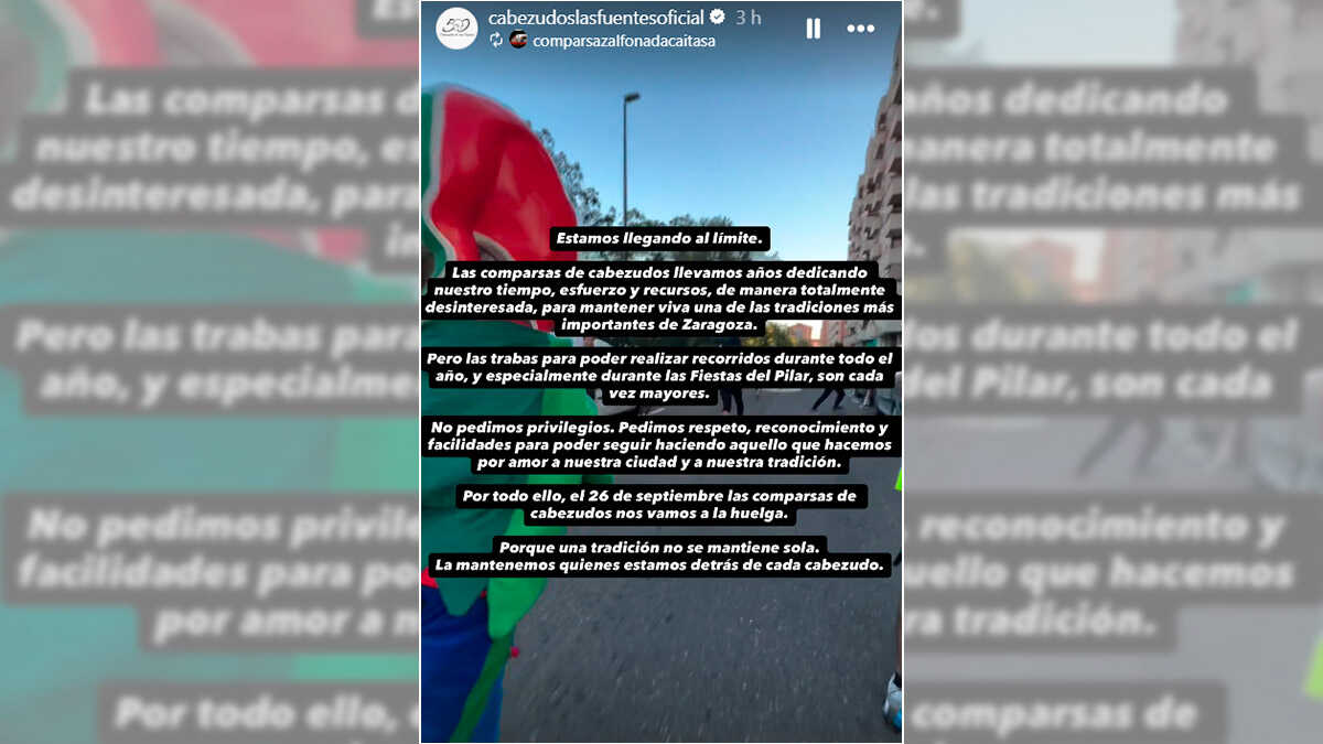 Zaragoza neighborhood big-head figures protest ban during Pilar Festival